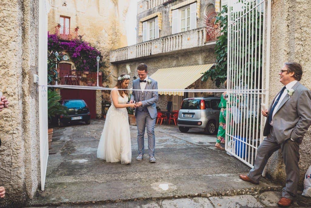 italy wedding photographer bride boho and blue suit relaxe