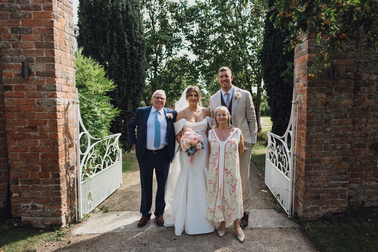 Katie & Joe’s Joyous Summer Wedding at Combermere Abbey